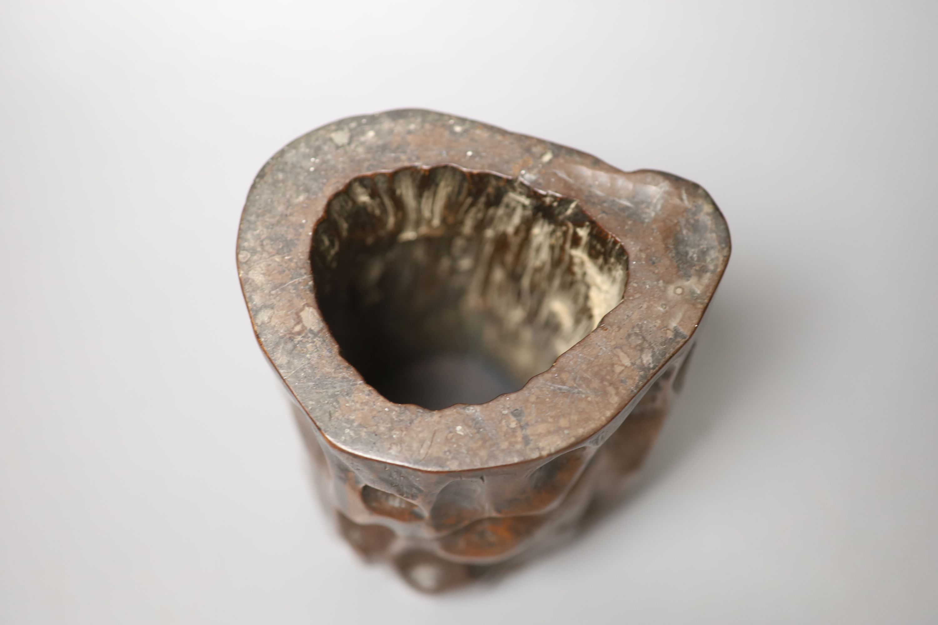 A Chinese carved hardwood brush pot, early 20th century, height 12cm